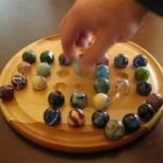 How To Play The Marble Board Game