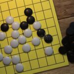 Board Game With White And Black Stones