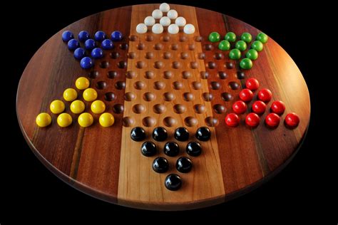 Game With Marbles And Board