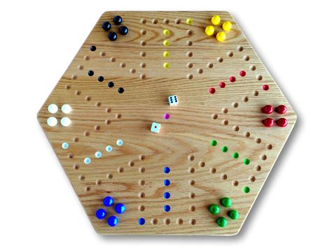 Board Game With Marbles And Holes